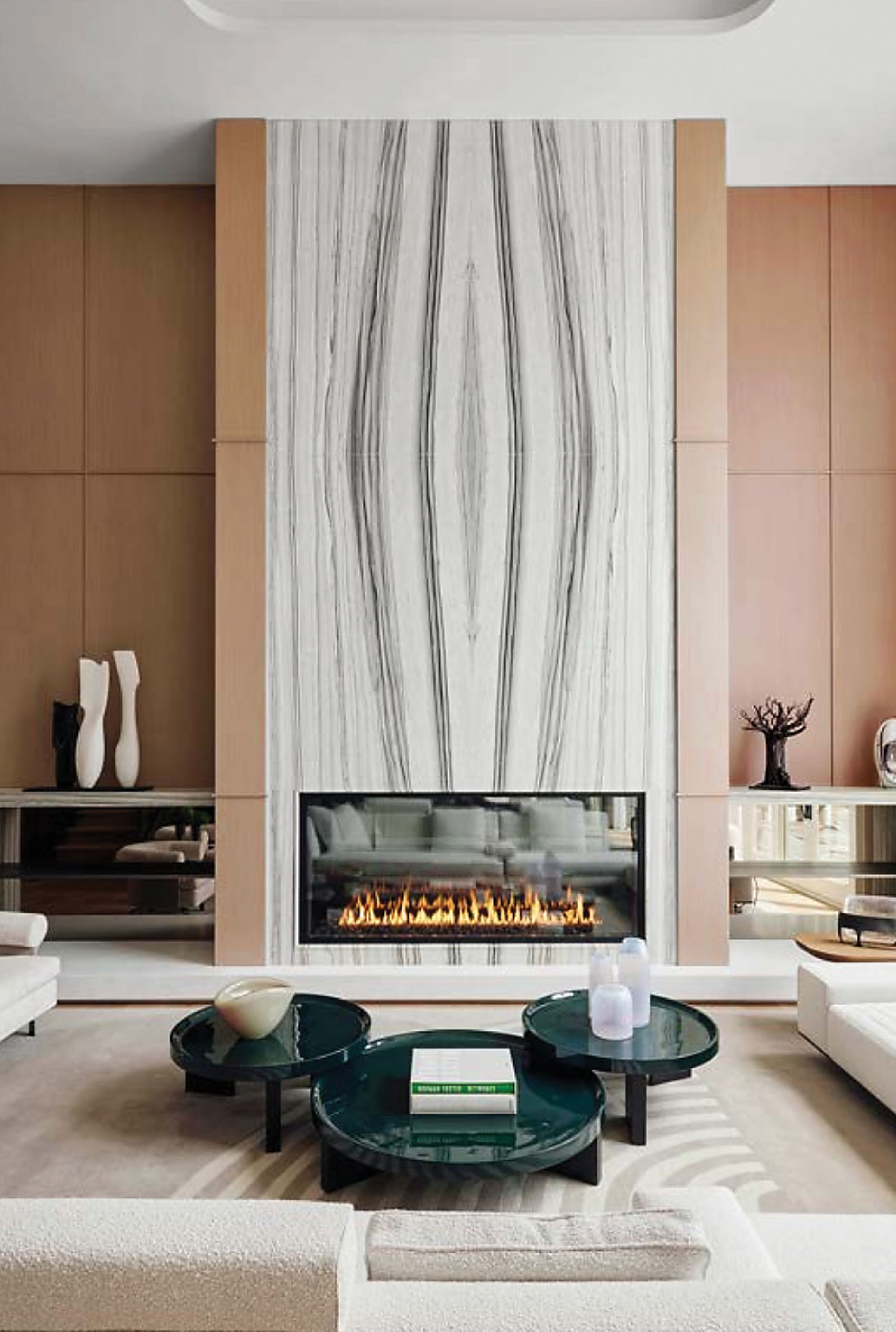 A living room with a fireplace and a large marble wall