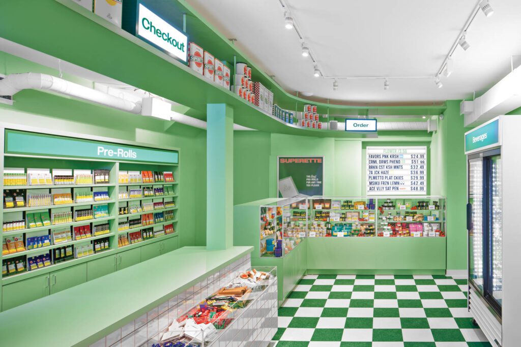 The shop’s menu board and wayfinding signs are custom.